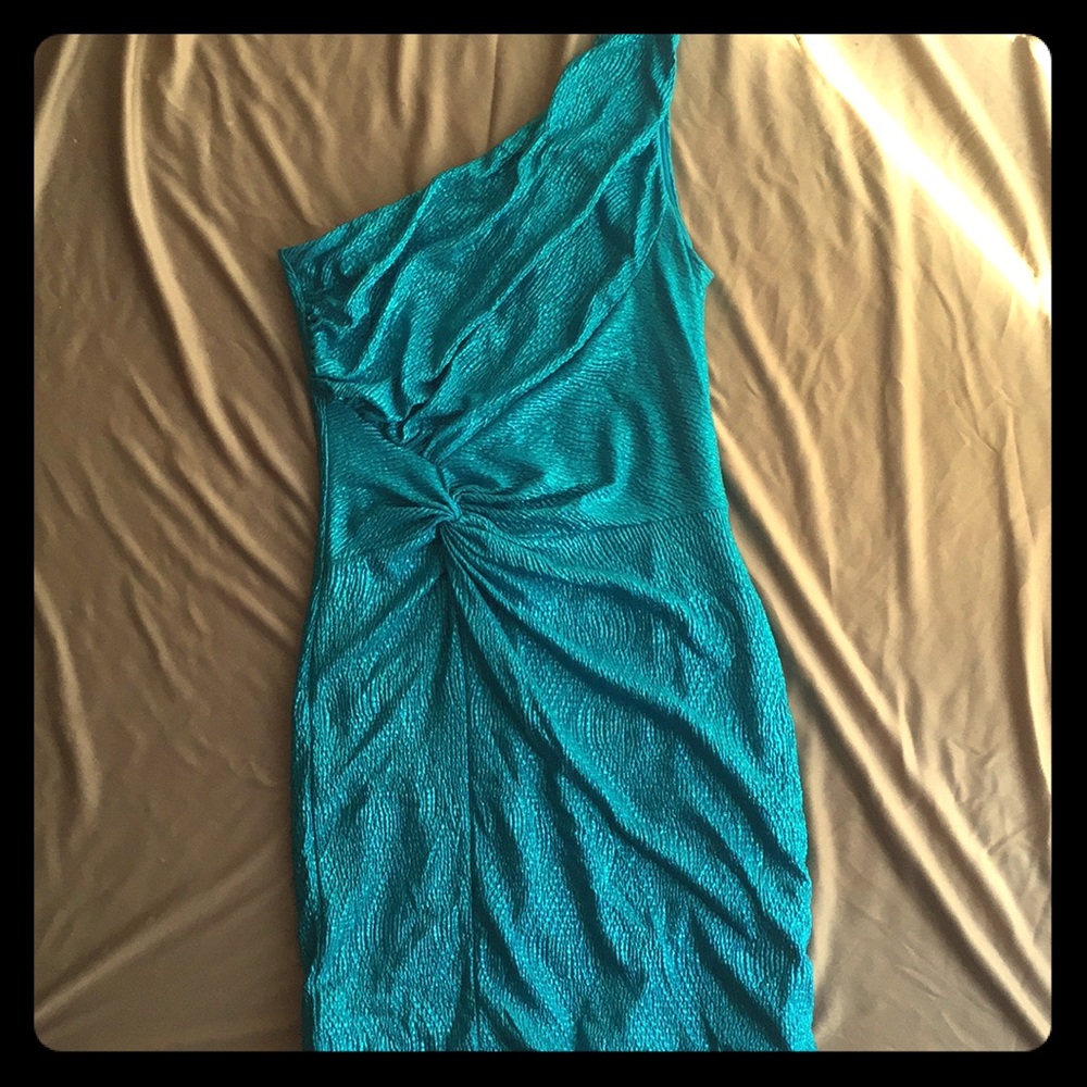 One-shouldered electric teal/blue dress.